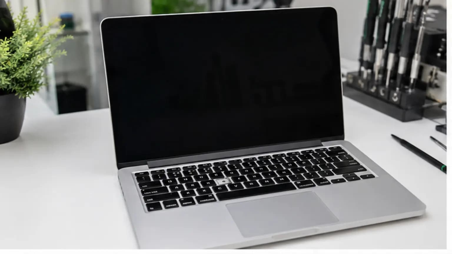 MacBook Repair Tampa repair case on the True One Fix workbench in Tampa