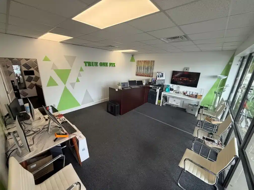 Interior of Trueonefix Computer Repair Shop in Tampa, showing a clean and modern workspace for MacBook repair services.”