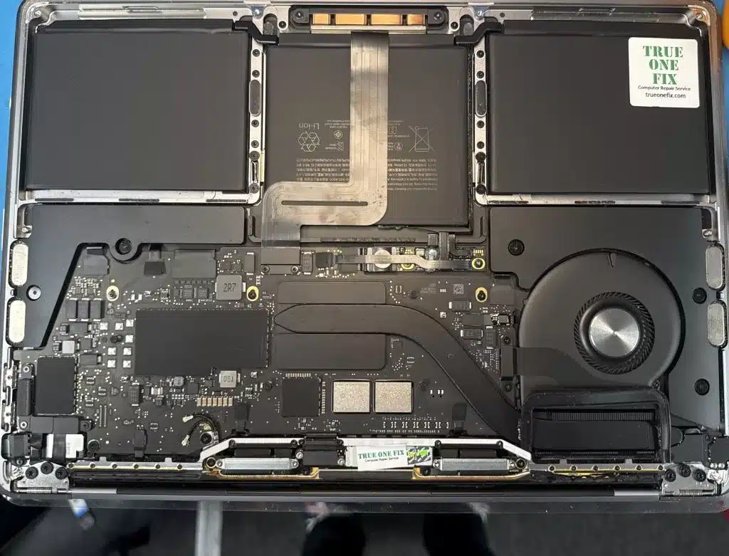 MacBook Pro battery being replaced at USF computer repair center