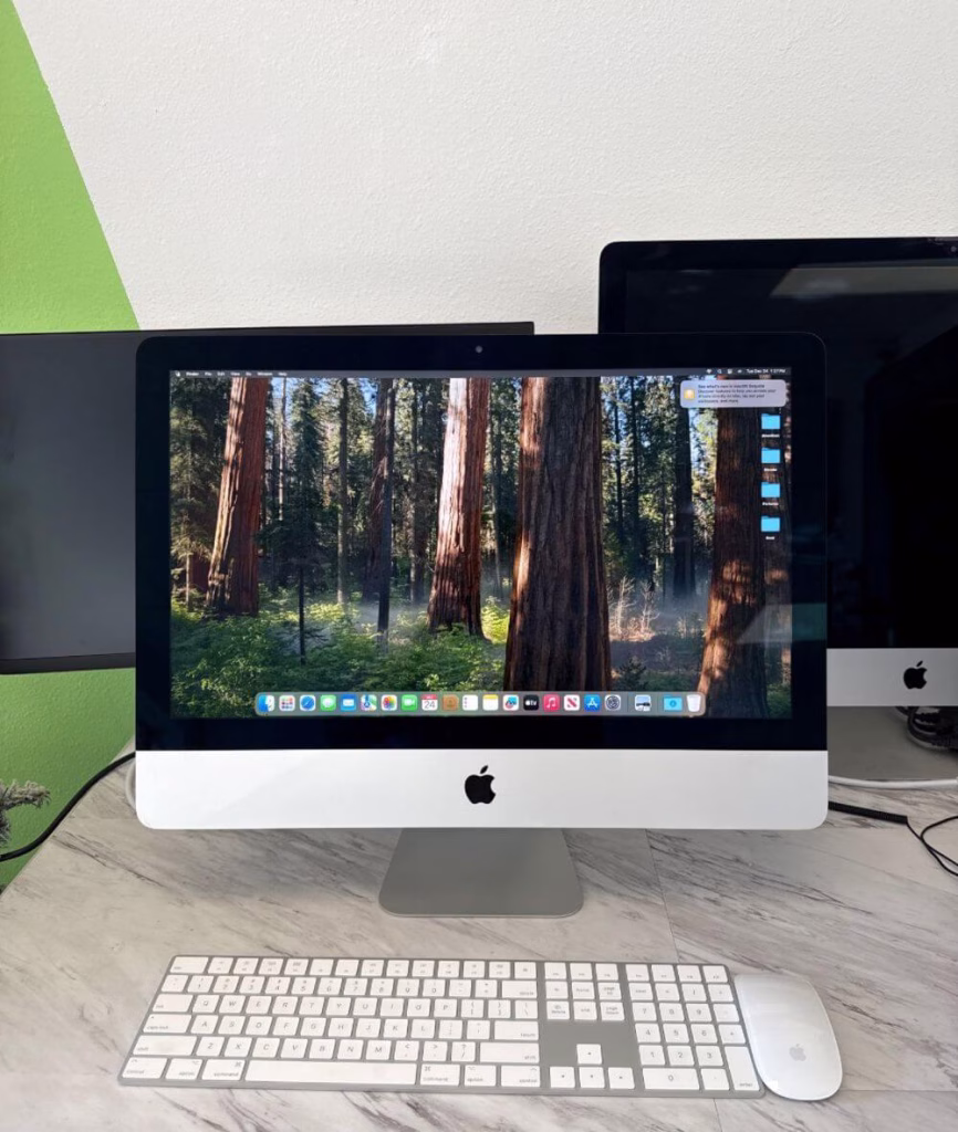 iMac screen replacement process at Trueonefix Tampa, showing the display panel removed during repair.